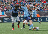 Jalil Anibaba (3), Jo Inge Berget (9) during Revolution and NYCFC MLS match at Gillette Stadium in Foxboro, MA on Saturday, March 24, 2018. The match ended 2-2. CREDIT/ CHRIS ADUAMA