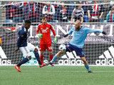 Jalil Anibaba (3), Jo Inge Berget (9) during Revolution and NYCFC MLS match at Gillette Stadium in Foxboro, MA on Saturday, March 24, 2018. The match ended 2-2. CREDIT/ CHRIS ADUAMA