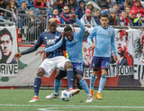 Wilfried Zahibo (23), Ebenezer Ofori (12) during Revolution and NYCFC MLS match at Gillette Stadium in Foxboro, MA on Saturday, March 24, 2018. The match ended 2-2. CREDIT/ CHRIS ADUAMA