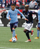 Jesus Medina (19),Wilfried Zahibo (23) during Revolution and NYCFC MLS match at Gillette Stadium in Foxboro, MA on Saturday, March 24, 2018. The match ended 2-2. CREDIT/ CHRIS ADUAMA