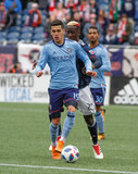 Jesus Medina (19), Wilfried Zahibo (23) during Revolution and NYCFC MLS match at Gillette Stadium in Foxboro, MA on Saturday, March 24, 2018. The match ended 2-2. CREDIT/ CHRIS ADUAMA