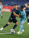 Marc Rzatkowski (90), Luis Caicedo (27) during N.E. Revolution and New York Red Bulls MLS match at Gillette Stadium in Foxboro, MA on Saturday, April 20, 2019. Revs won 1-0. CREDIT/ CHRIS ADUAMA
