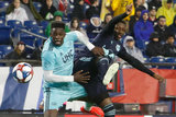 Jalil Anibaba (3), Derrick Etienne (7) during N.E. Revolution and New York Red Bulls MLS match at Gillette Stadium in Foxboro, MA on Saturday, April 20, 2019. Revs won 1-0. CREDIT/ CHRIS ADUAMA