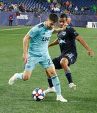 Carles Gil (22), Cristian Casseres Jr (23) during N.E. Revolution and New York Red Bulls MLS match at Gillette Stadium in Foxboro, MA on Saturday, April 20, 2019. Revs won 1-0. CREDIT/ CHRIS ADUAMA
