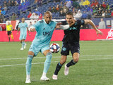 Teal Bunbury (10),  Aaron Long (33) during N.E. Revolution and New York Red Bulls MLS match at Gillette Stadium in Foxboro, MA on Saturday, April 20, 2019. Revs won 1-0. CREDIT/ CHRIS ADUAMA