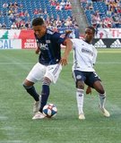 Juan Agudelo (17), Jamiro Monteiro (35) during New England Revolution and Philadelphia Union MLS match at Gillette Stadium in Foxboro, MA on Wednesday, June 26, 2019. The match ended in 1-1 tie. CREDIT/CHRIS ADUAMA