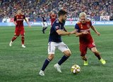 Carles Gil (22), Kelyn Rowe (6) during New England Revolution and Real Salt Lake MLS match at Gillette Stadium in Foxboro, MA on Saturday, September 21, 2019. The match ended 0-0 tie. CREDIT/CHRIS ADUAMA.