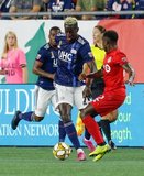 Wilfried Zahibo (23), Richie Laryea (22) during New England Revolution and Toronto FC MLS match at Gillette Stadium in Foxboro, MA on Saturday, August 31, 2019. The match ended in 1-1 tie. CREDIT/ CHRIS ADUAMA