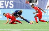 Alejandro Pozuelo (10), Wilfried Zahibo (23), Richie Laryea (22) during New England Revolution and Toronto FC MLS match at Gillette Stadium in Foxboro, MA on Saturday, August 31, 2019. The match ended in 1-1 tie. CREDIT/ CHRIS ADUAMA