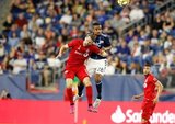 Patrick Mullins (13), Michael Mancienne (28) during New England Revolution and Toronto FC MLS match at Gillette Stadium in Foxboro, MA on Saturday, August 31, 2019. The match ended in 1-1 tie. CREDIT/ CHRIS ADUAMA
