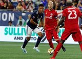 Juan Agudelo (17), Michael Bradley (4) during New England Revolution and Toronto FC MLS match at Gillette Stadium in Foxboro, MA on Saturday, August 31, 2019. The match ended in 1-1 tie. CREDIT/ CHRIS ADUAMA