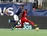 Richie Laryea (22), DeJuan Jones (24) during New England Revolution and Toronto FC MLS match at Gillette Stadium in Foxboro, MA on Saturday, August 31, 2019. The match ended in 1-1 tie. CREDIT/ CHRIS ADUAMA