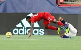 Richie Laryea (22), DeJuan Jones (24) during New England Revolution and Toronto FC MLS match at Gillette Stadium in Foxboro, MA on Saturday, August 31, 2019. The match ended in 1-1 tie. CREDIT/ CHRIS ADUAMA