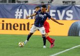 Juan Agudelo (17), Nicolas Benezet (7) during New England Revolution and Toronto FC MLS match at Gillette Stadium in Foxboro, MA on Saturday, August 31, 2019. The match ended in 1-1 tie. CREDIT/ CHRIS ADUAMA