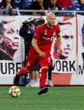 Carles Gil (22), Michael Bradley (4) during New England Revolution and Toronto FC MLS match at Gillette Stadium in Foxboro, MA on Saturday, August 31, 2019. The match ended in 1-1 tie. CREDIT/ CHRIS ADUAMA