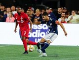 Ashtone Morgan (5), Carles Gil (22) during New England Revolution and Toronto FC MLS match at Gillette Stadium in Foxboro, MA on Saturday, August 31, 2019. The match ended in 1-1 tie. CREDIT/ CHRIS ADUAMA