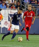 Gustavo Bou (7), Nick DeLeon (18) during New England Revolution and Toronto FC MLS match at Gillette Stadium in Foxboro, MA on Saturday, August 31, 2019. The match ended in 1-1 tie. CREDIT/ CHRIS ADUAMA