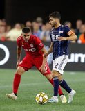 Alejandro Pozuelo (10),Carles Gil (22) during New England Revolution and Toronto FC MLS match at Gillette Stadium in Foxboro, MA on Saturday, August 31, 2019. The match ended in 1-1 tie. CREDIT/ CHRIS ADUAMA