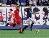 Nick DeLeon (18), Gustavo Bou (7) during New England Revolution and Toronto FC MLS match at Gillette Stadium in Foxboro, MA on Saturday, August 31, 2019. The match ended in 1-1 tie. CREDIT/ CHRIS ADUAMA