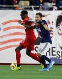 Richie Laryea (22), Diego Fagundez (14) during New England Revolution and Toronto FC MLS match at Gillette Stadium in Foxboro, MA on Saturday, August 31, 2019. The match ended in 1-1 tie. CREDIT/ CHRIS ADUAMA