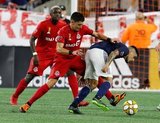 Alejandro Pozuelo (10), Gustavo Bou (7) during New England Revolution and Toronto FC MLS match at Gillette Stadium in Foxboro, MA on Saturday, August 31, 2019. The match ended in 1-1 tie. CREDIT/ CHRIS ADUAMA