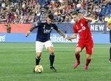 Gustavo Bou (7), Patrick Mullins (13) during New England Revolution and Toronto FC MLS match at Gillette Stadium in Foxboro, MA on Saturday, August 31, 2019. The match ended in 1-1 tie. CREDIT/ CHRIS ADUAMA