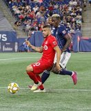 Alejandro Pozuelo (10), Wilfried Zahibo (23) during New England Revolution and Toronto FC MLS match at Gillette Stadium in Foxboro, MA on Saturday, August 31, 2019. The match ended in 1-1 tie. CREDIT/ CHRIS ADUAMA