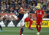 Michael Mancienne (28), Patrick Mullins (13) during New England Revolution and Toronto FC MLS match at Gillette Stadium in Foxboro, MA on Saturday, August 31, 2019. The match ended in 1-1 tie. CREDIT/ CHRIS ADUAMA