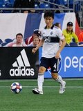 Hwang In-Beom (4) during New England Revolution and Vancouver Whitecaps FC MLS match at Gillette Stadium in Foxboro, MA on Wednesday, July 17, 2019.  Revs won 4-0. CREDIT/CHRIS ADUAMA