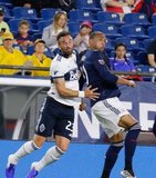 Scott Sutter (23), Teal Bunbury (10) during New England Revolution and Vancouver Whitecaps FC MLS match at Gillette Stadium in Foxboro, MA on Wednesday, July 17, 2019.  Revs won 4-0. CREDIT/CHRIS ADUAMA