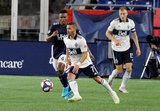 DeJuan Jones (24), Lucas Venuto (7) during New England Revolution and Vancouver Whitecaps FC MLS match at Gillette Stadium in Foxboro, MA on Wednesday, July 17, 2019.  Revs won 4-0. CREDIT/CHRIS ADUAMA