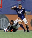 Gustavo Bou (7), Derek Cornelius (13) during New England Revolution and Vancouver Whitecaps FC MLS match at Gillette Stadium in Foxboro, MA on Wednesday, July 17, 2019.  Revs won 4-0. CREDIT/CHRIS ADUAMA