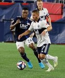 DeJuan Jones (24), Lucas Venuto (7) during New England Revolution and Vancouver Whitecaps FC MLS match at Gillette Stadium in Foxboro, MA on Wednesday, July 17, 2019.  Revs won 4-0. CREDIT/CHRIS ADUAMA