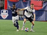 Luis Caicedo (27), Andy Rose (15) during New England Revolution and Vancouver Whitecaps FC MLS match at Gillette Stadium in Foxboro, MA on Wednesday, July 17, 2019.  Revs won 4-0. CREDIT/CHRIS ADUAMA