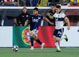 Carles Gil (22), Victor Giro (94) during New England Revolution and Vancouver Whitecaps FC MLS match at Gillette Stadium in Foxboro, MA on Wednesday, July 17, 2019.  Revs won 4-0. CREDIT/CHRIS ADUAMA