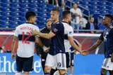 Fredy Montero (12), Antonio Delamea (19) during New England Revolution and Vancouver Whitecaps FC MLS match at Gillette Stadium in Foxboro, MA on Wednesday, July 17, 2019.  Revs won 4-0. CREDIT/CHRIS ADUAMA
