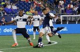 Derek Cornelius (13), Gustavo Bou (7) during New England Revolution and Vancouver Whitecaps FC MLS match at Gillette Stadium in Foxboro, MA on Wednesday, July 17, 2019.  Revs won 4-0. CREDIT/CHRIS ADUAMA
