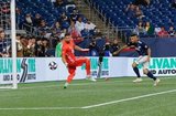 Diego Fagundez (14) scores goal during New England Revolution and Vancouver Whitecaps FC MLS match at Gillette Stadium in Foxboro, MA on Wednesday, July 17, 2019.  Revs won 4-0. CREDIT/CHRIS ADUAMA